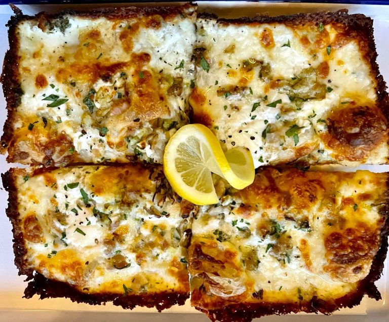 Read more about the article Review: At Marble + Rye, taking pizza and video games downtown